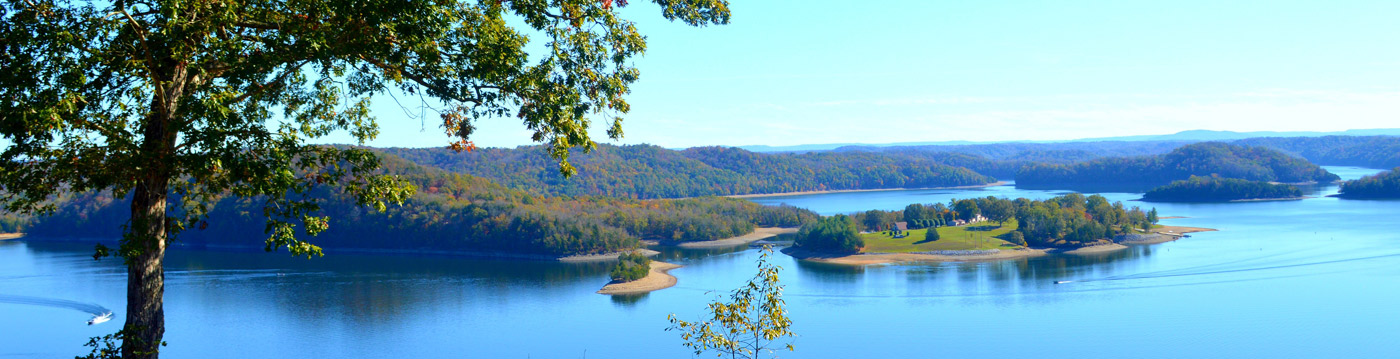 areal view of lake, islands and boats on the lake